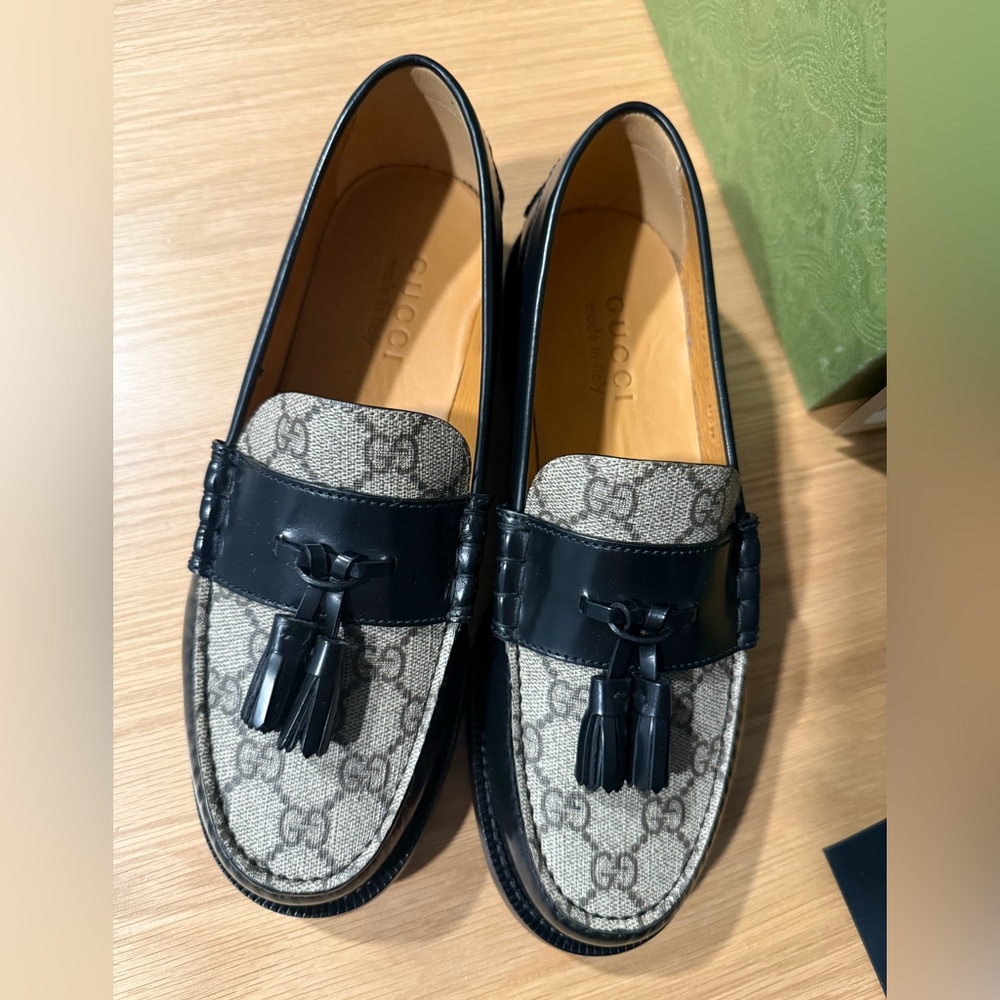 Gucci Black and Tan Loafers with Tassel Detail